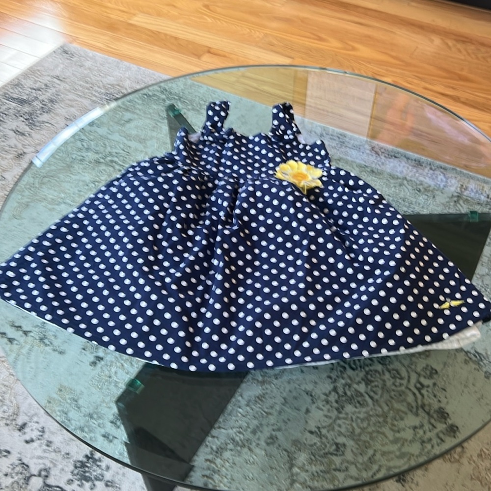 Navy Polka Dot Dress with Yellow Flower Accent